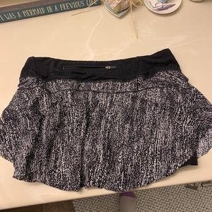 Never worn (without tags) Lululemon tennis skirt